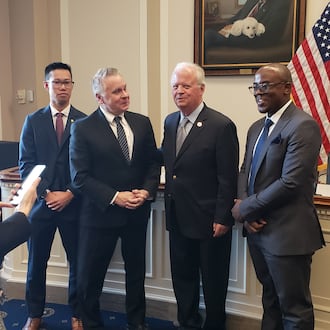 Former Dayton Congressman Tony Hall meets with U.S. Rep. Chris Smith, R-New Jersey, after testifying before the House Foreign Affairs Committee about cobalt mining in the Democratic Republic of Congo. JAMIE DUPREE/CONTRIBUTED