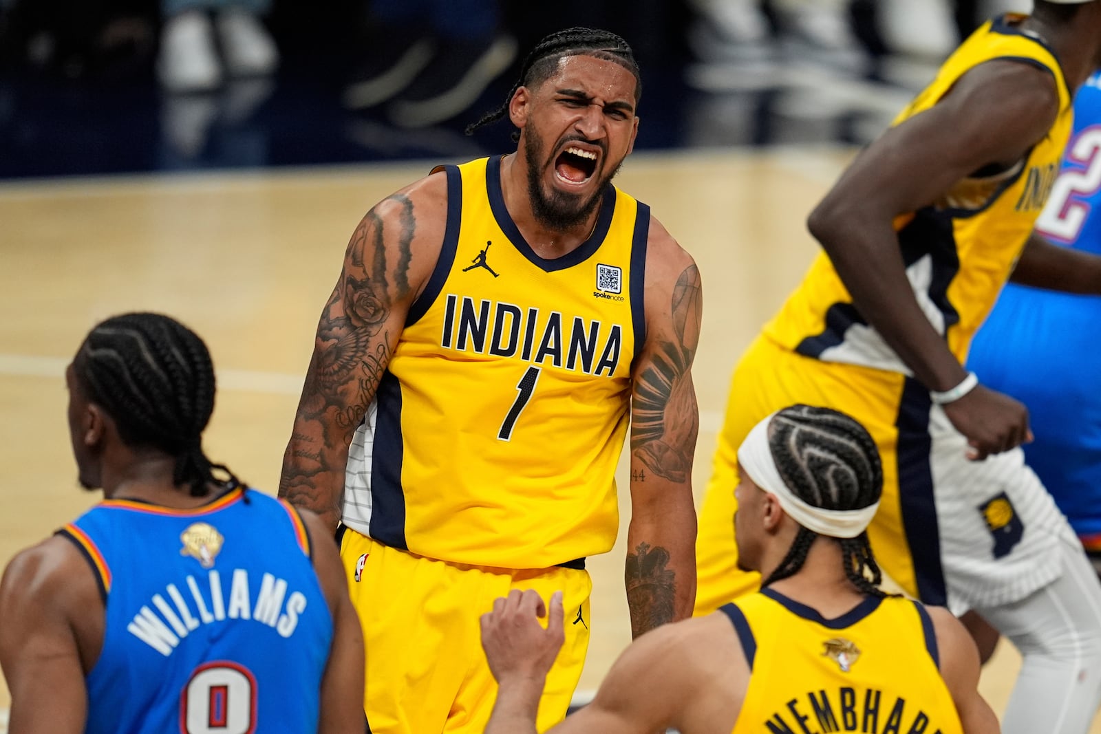 Indiana Pacers forward Obi Toppin (1) celebrates a basket against the Oklahoma City Thunder during the second half of Game 4 of the NBA Finals basketball series, Friday, June 13, 2025, in Indianapolis. (AP Photo/Abbie Parr)