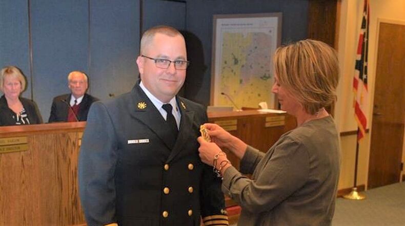 Washington Twp. swore-in a new fire chief Monday night as Deputy Chief Scott Kujawa had his new badge pinned on by his wife Jenny.