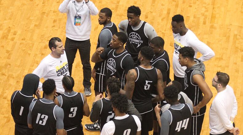 Derek Kellogg talks to his Long Island-Brooklyn players on Monday during a practice for the First Four on Monday, March 12, 2018, at UD Arena.