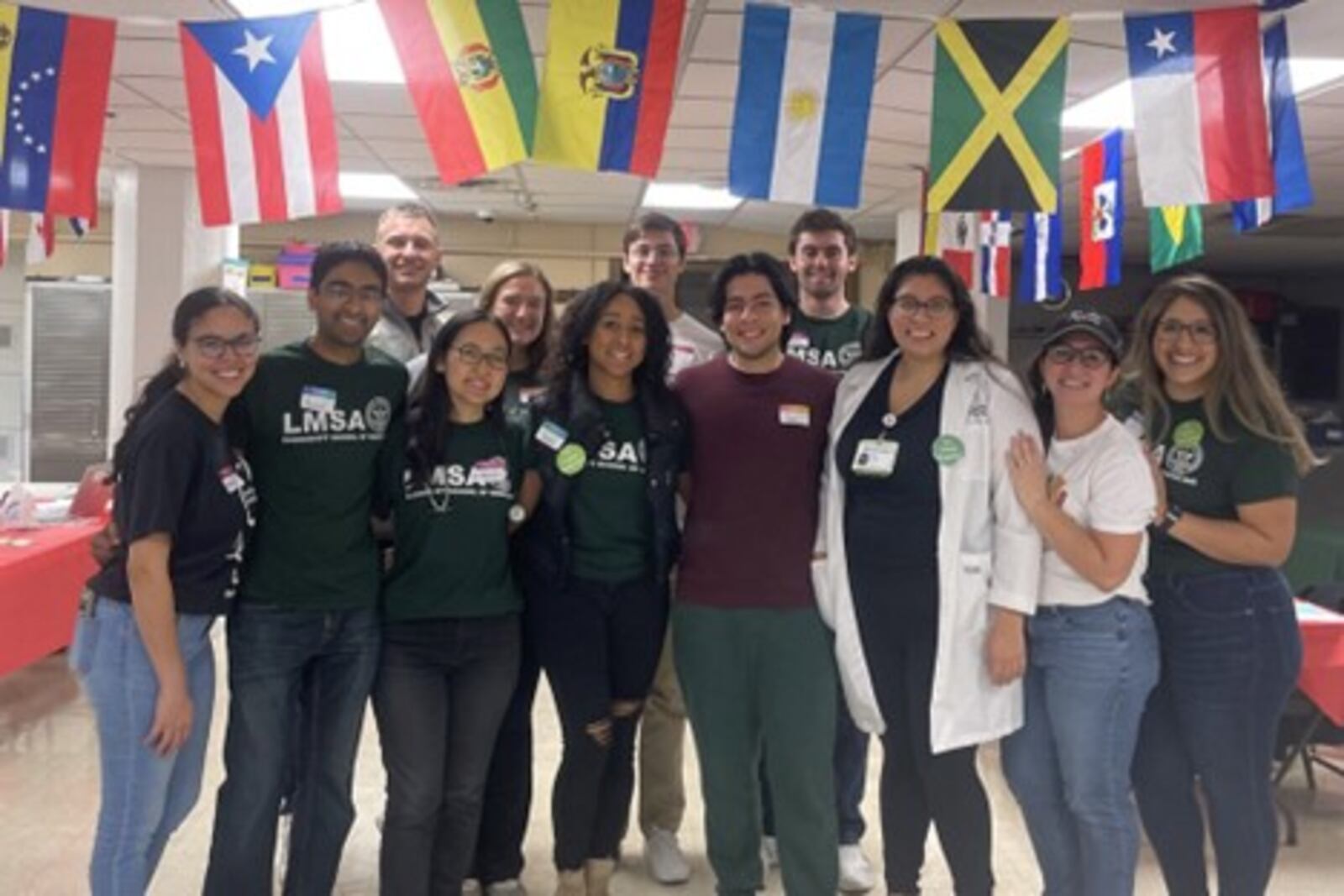 Wright State University and Boonshoft School of Medicine students are partnering to hold Latino Wellness Clinics geared toward people in the community who only or mostly speak Spanish, with the next one coming up on Dec. 9. Pictured in the first row, left to right, are Gisella Drouet, Ankur Parekh, Deborah Lee, Sade Fayiga, Ian Pabon Gonazalez, Dr. Ruth Claros, Catherine Hernandez Hogan, and Enedina Sepulveda Martinez. In the second row are Will Bohne, Sam Doehring, Steffen Fallini, and Kevin Williams. PROVIDED