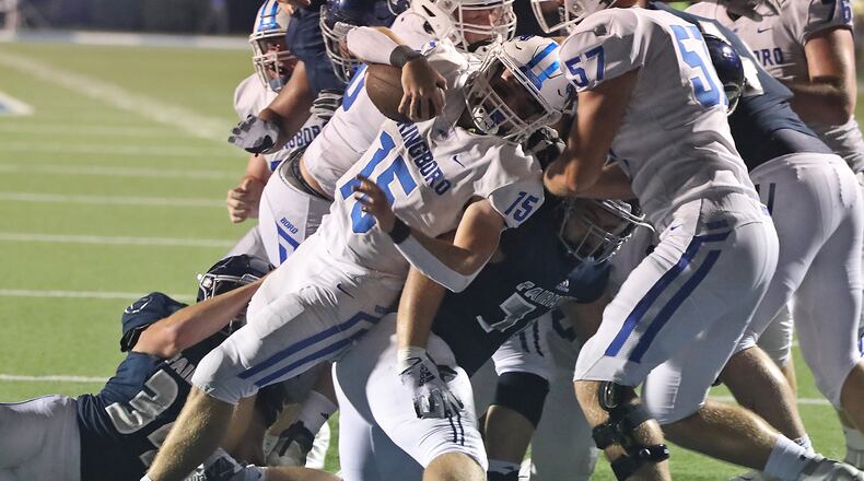 Springboro quarterback Evan Ruzzo drives into the end zone for a Springboro touchdown against Fairmont on Friday, Sept. 16, 2022. BILL LACKEY/STAFF