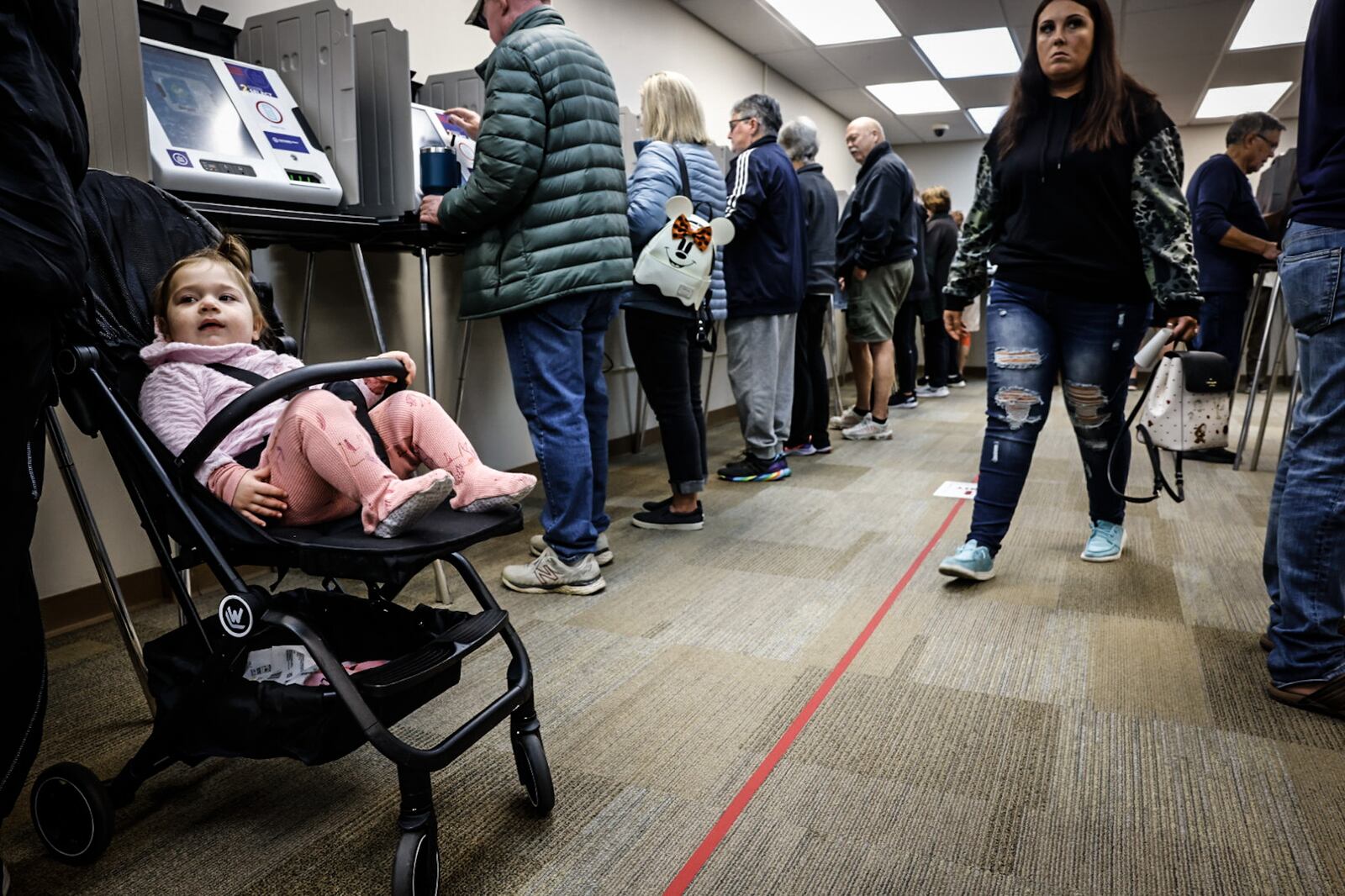 Hundreds of early voters waited in line to vote at the Montgomery County Board of Elections Monday morning October 28, 2024. JIM NOELKER/STAFF