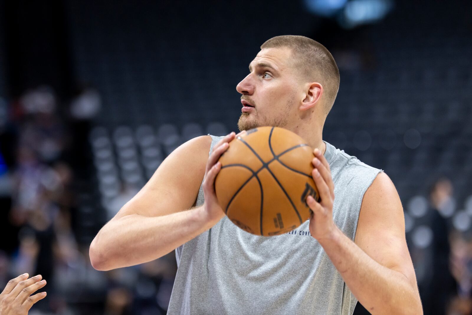 Denver Nuggets center Nikola Jokic warms up before an NBA basketball game against the Sacramento Kings, Wednesday, April 9, 2025, in Sacramento, Calif. (AP Photo/Sara Nevis)
