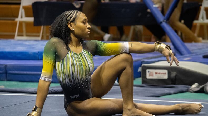 Diamond Cook, a sophomore from Minneapolis who transferred to Wilberforce last fall after Talladega College abruptly disbanded the program in July, takes a break during Sunday’s competition. She finished with her highest score ever (9.75) in the floor exercise. Christian Locke/CONTRIBUTED