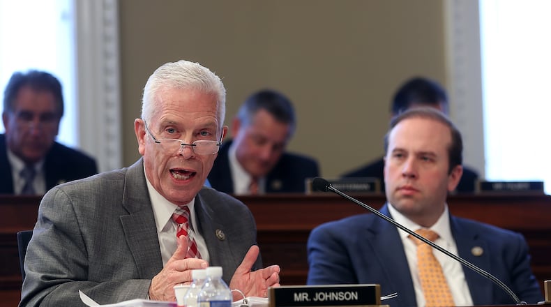 U.S. Rep. Bill Johnson (L) (R-OH) speaks as Rep. Jason Smith (R) (R-MO) looks on during a House Budget Committee markup of the Republican health care bill on Capitol Hill on March 16, 2017 in Washington, DC.