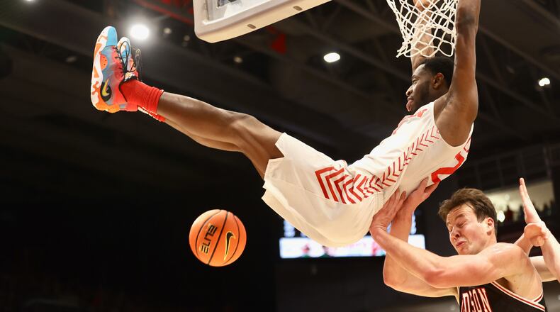 Dayton's R.J. Blakney dunks against Davidson on Tuesday, Jan. 17, 2023, at UD Arena. David Jablonski/Staff