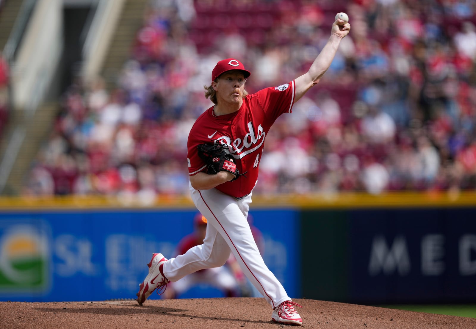 Cincinnati Reds pitcher Andrew Abbott throws in the first inning of a baseball game against the Chicago Cubs, Saturday, May 24, 2025, in Cincinnati. (AP Photo/Carolyn Kaster)