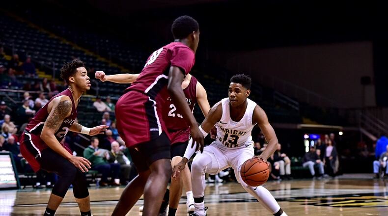Wright State’s Malachi Smith looks for room to manuever during Thursday night’s against Northwestern Ohio at the Nutter Center. Joseph Craven/CONTRIBUTED