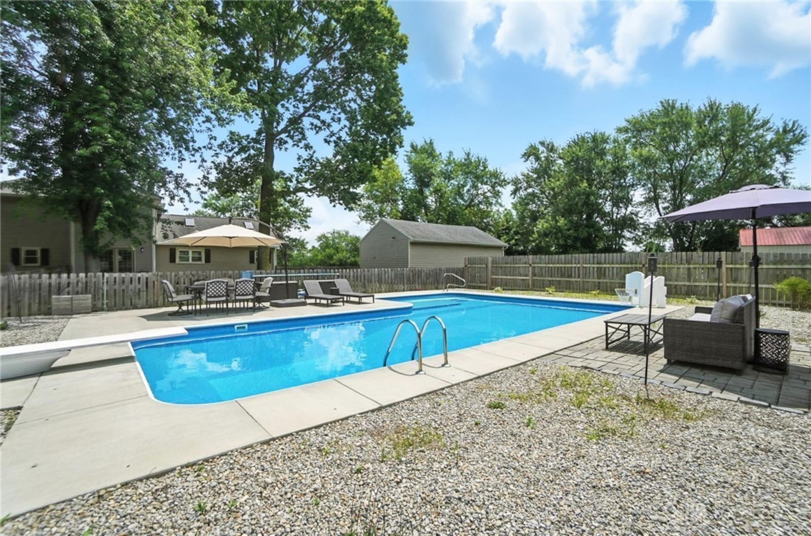 The house includes a heated, saltwater inground pool with concrete patio and stone accents. It is completely fenced with a wood privacy fence. CONTRIBUTED