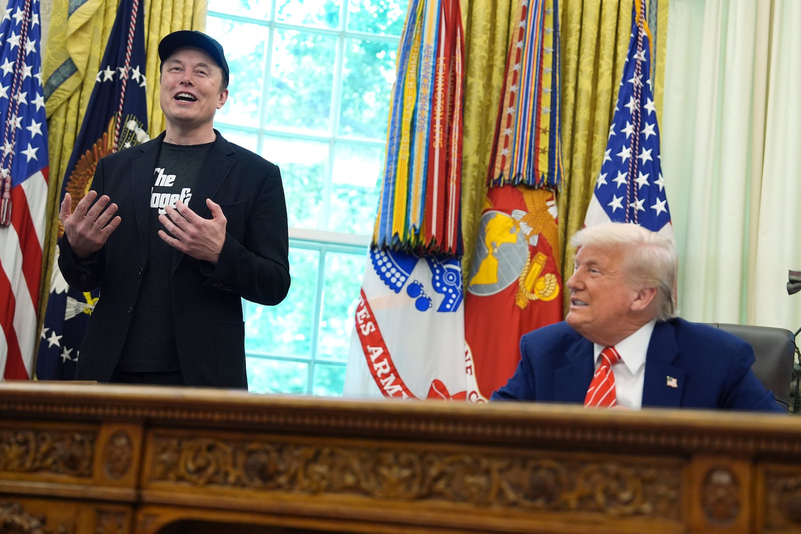 Elon Musk speaks during a news conference with President Donald Trump in the Oval Office of the White House, Friday, May 30, 2025, in Washington. (AP Photo/Evan Vucci)
