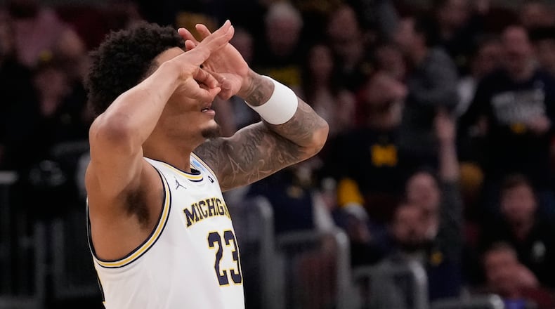 Michigan's Yaxel Lendeborg celebrates after making a 3-point basket during the second half in the Sweet 16 of the NCAA college basketball tournament against Alabama, Friday, March 27, 2026, in Chicago. (AP Photo/Nam Y. Huh)