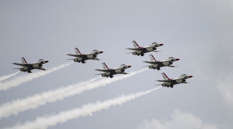 The United States Air Force Thunderbirds returned to the Dayton Air Show on Thursday after a four-year absence due in part to military budget cuts. The team is scheduled to perform on Saturday and Sunday at the Dayton International Airport. TY GREENLEES / STAFF