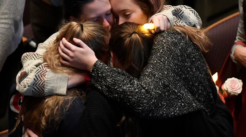 THOUSAND OAKS, CA - NOVEMBER 08: Mourners cry and comfort each other during a vigil for the victims of the mass shooting at the Thousand Oaks Civic Arts Plaza on November 8, 2018 in Thousand Oaks, California. Twelve people including a Ventura County Sheriff sergeant and the gunman died in the mass shooting at Borderline Bar and Grill . (Photo by Kevork Djansezian/Getty Images)