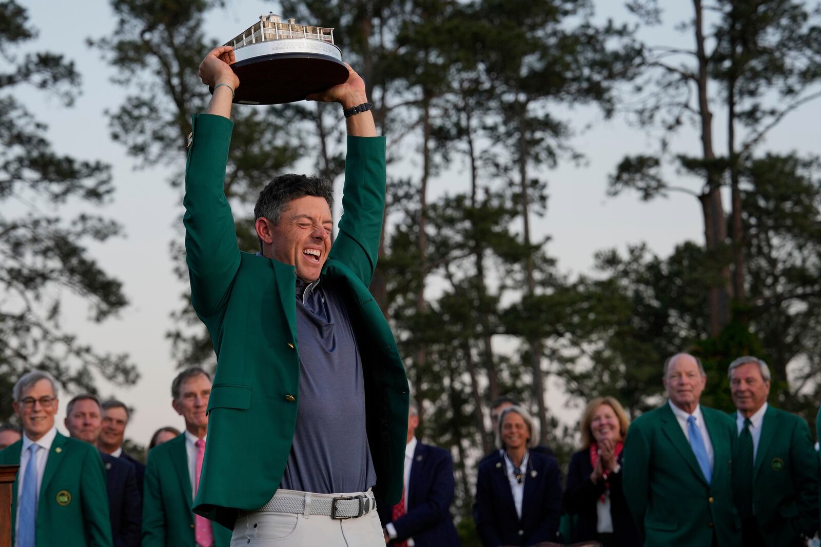 Winner Rory McIlroy, of Northern Ireland, holds the trophy at the Masters golf tournament, Sunday, April 13, 2025, in Augusta, Ga. (AP Photo/David J. Phillip)