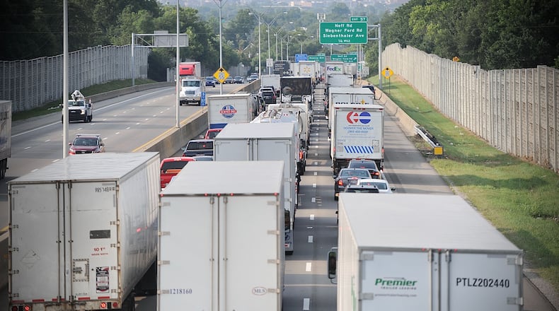 Traffic backed up for miles July 30, 2021, on Interstate 75 south after a fatal crash near Stanley Avenue in Dayton closed the southbound lanes. MARSHALL GORBY / STAFF