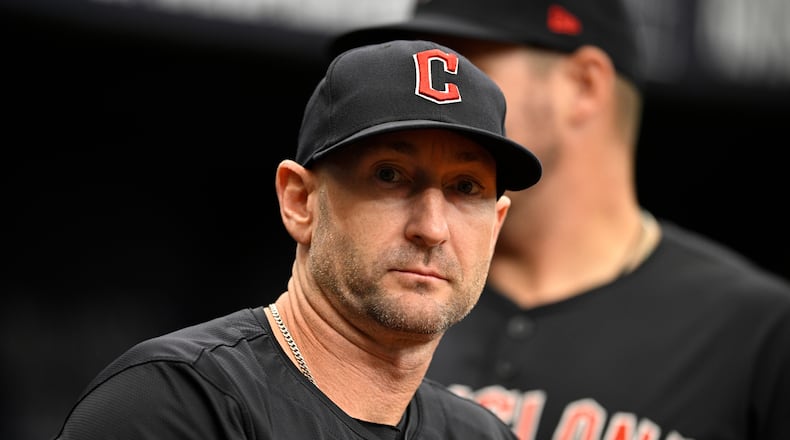 FILE - Cleveland Guardians bench coach Craig Albernaz looks on from the dugout before a baseball game against the Tampa Bay Rays, July 14, 2024, in St. Petersburg, Fla. (AP Photo/Phelan M. Ebenhack, File)