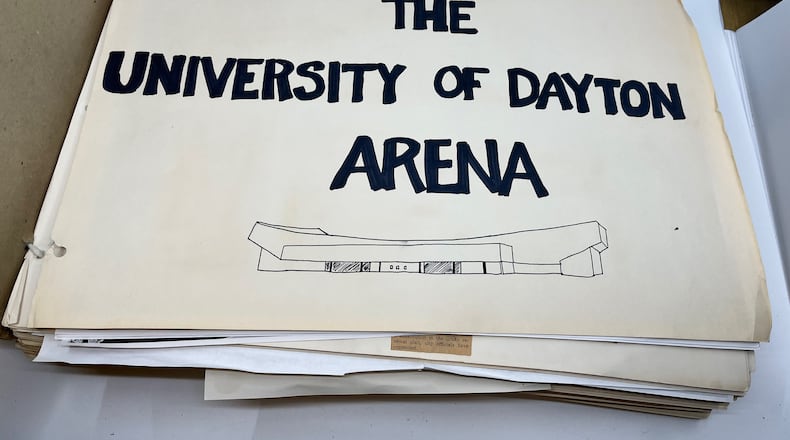 PHOTOS FROM THE BOOK: The Epicenter of College Basketball: A History of UD Arena — The scrapbook kept by Tom Frericks, the man most responsible for getting UD Arena built, includes newspaper clips, photos and other material related to the construction of the arena. Photo by David Jablonski