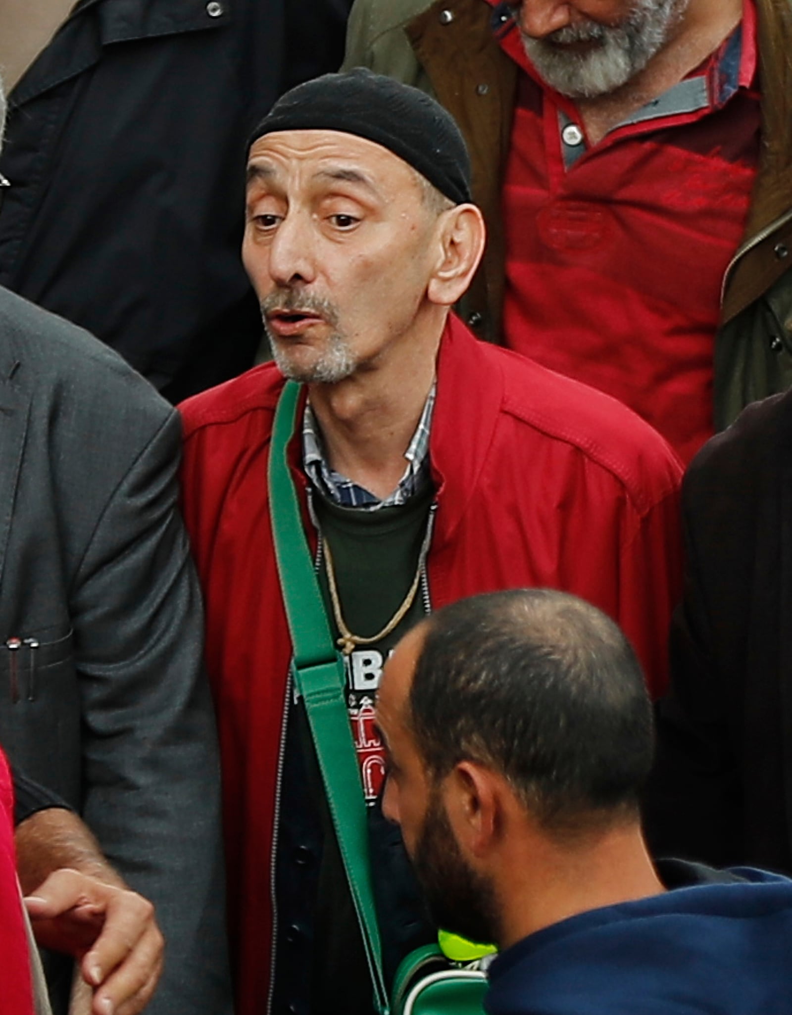 Ziad Rahbani, centre, a visionary Lebanese composer, playwright and pianist, during an anti-government protest organized by the country's communist party, in Beirut, Lebanon, Sunday, Dec. 16, 2018. (AP Photo/Hussein Malla)