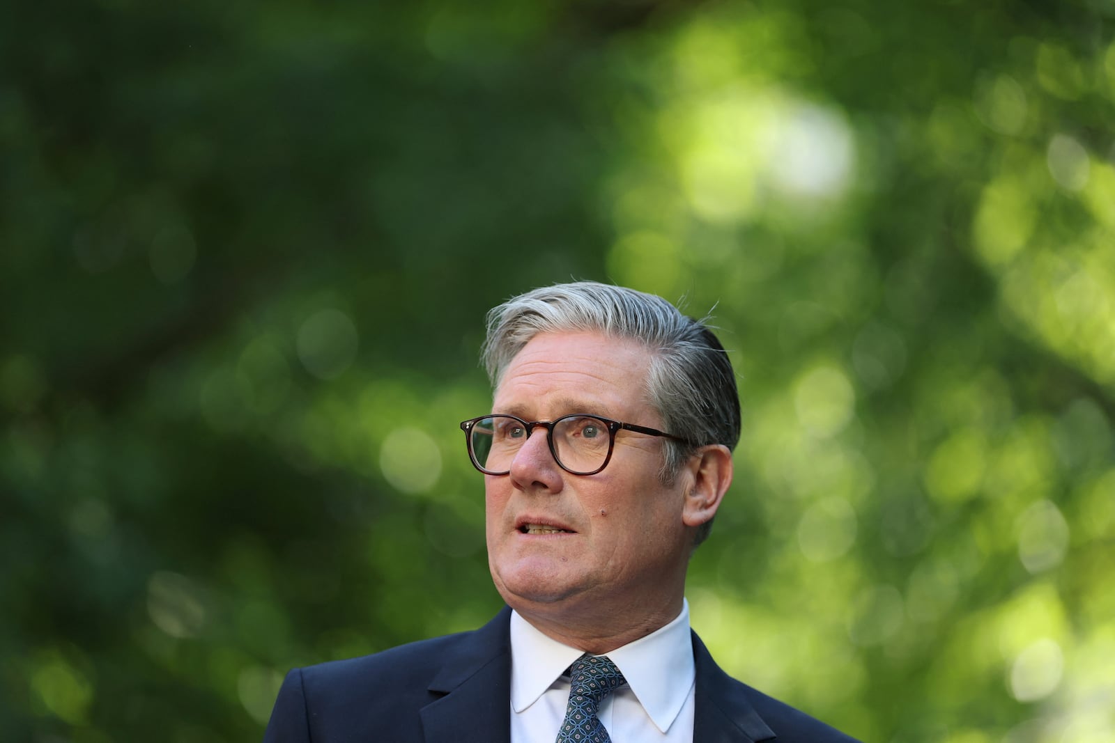Britain's Prime Minister Keir Starmer speaks during a reception following the UK-EU summit, in London, Monday May 19, 2025. (Hannah McKay/Pool via AP)