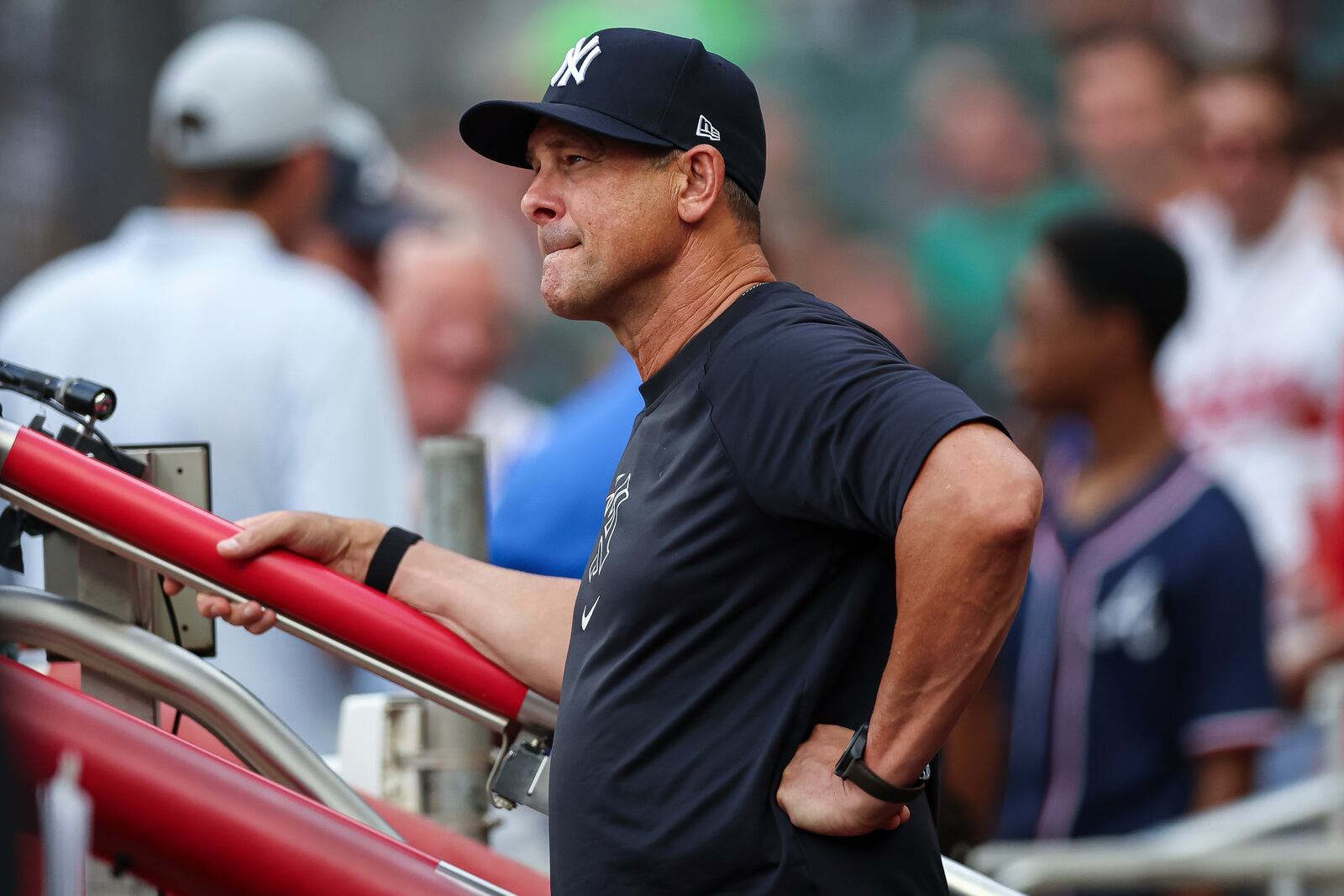 New York Yankees manager Aaron Boone reacts during the third inning of a baseball game against the Atlanta Braves, Friday, July 18, 2025, in Atlanta. (AP Photo/Colin Hubbard)