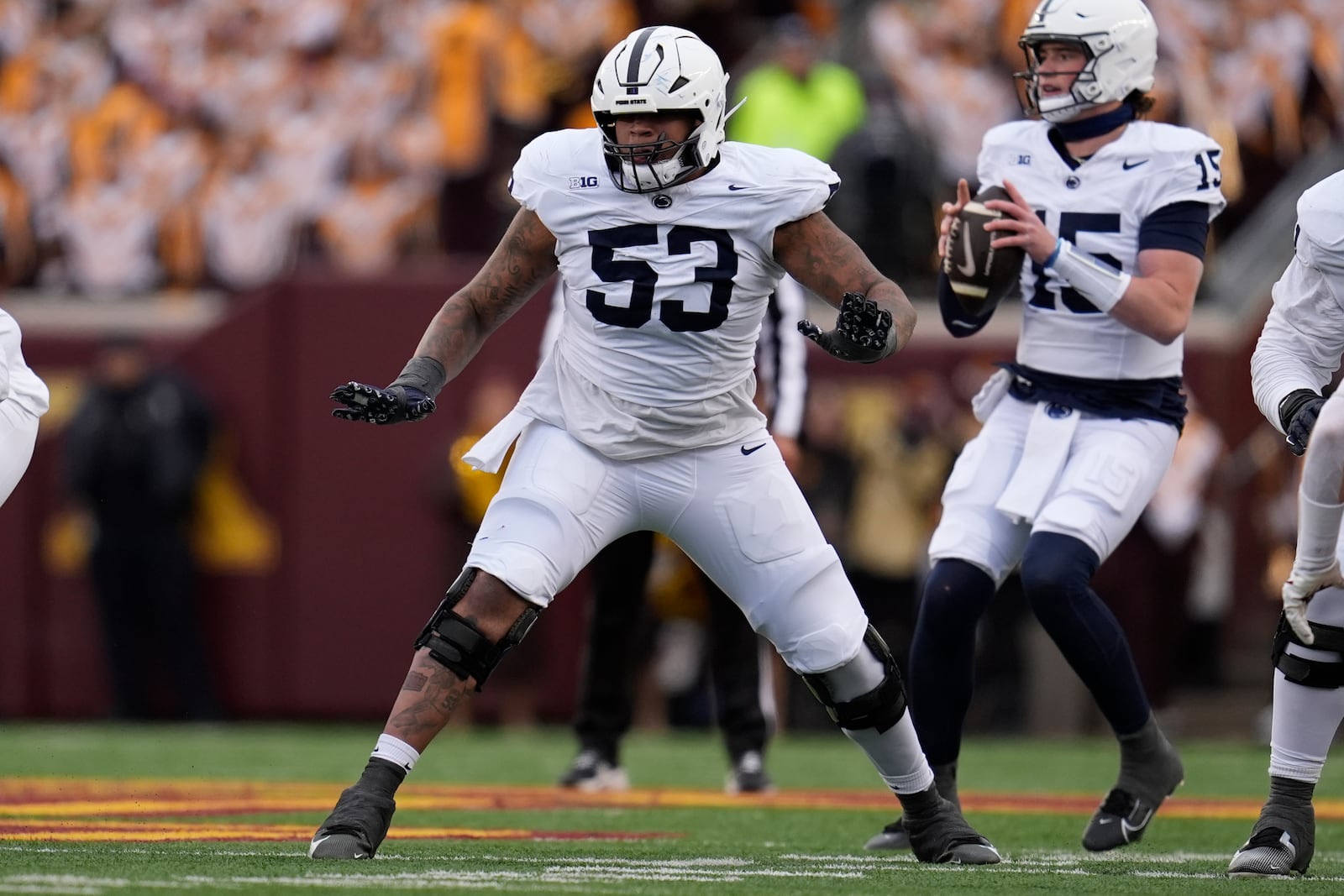 FILE - Penn State offensive lineman Nick Dawkins (53) in action during the first half of an NCAA college football game against Minnesota, Nov. 23, 2024, in Minneapolis. (AP Photo/Abbie Parr, File)