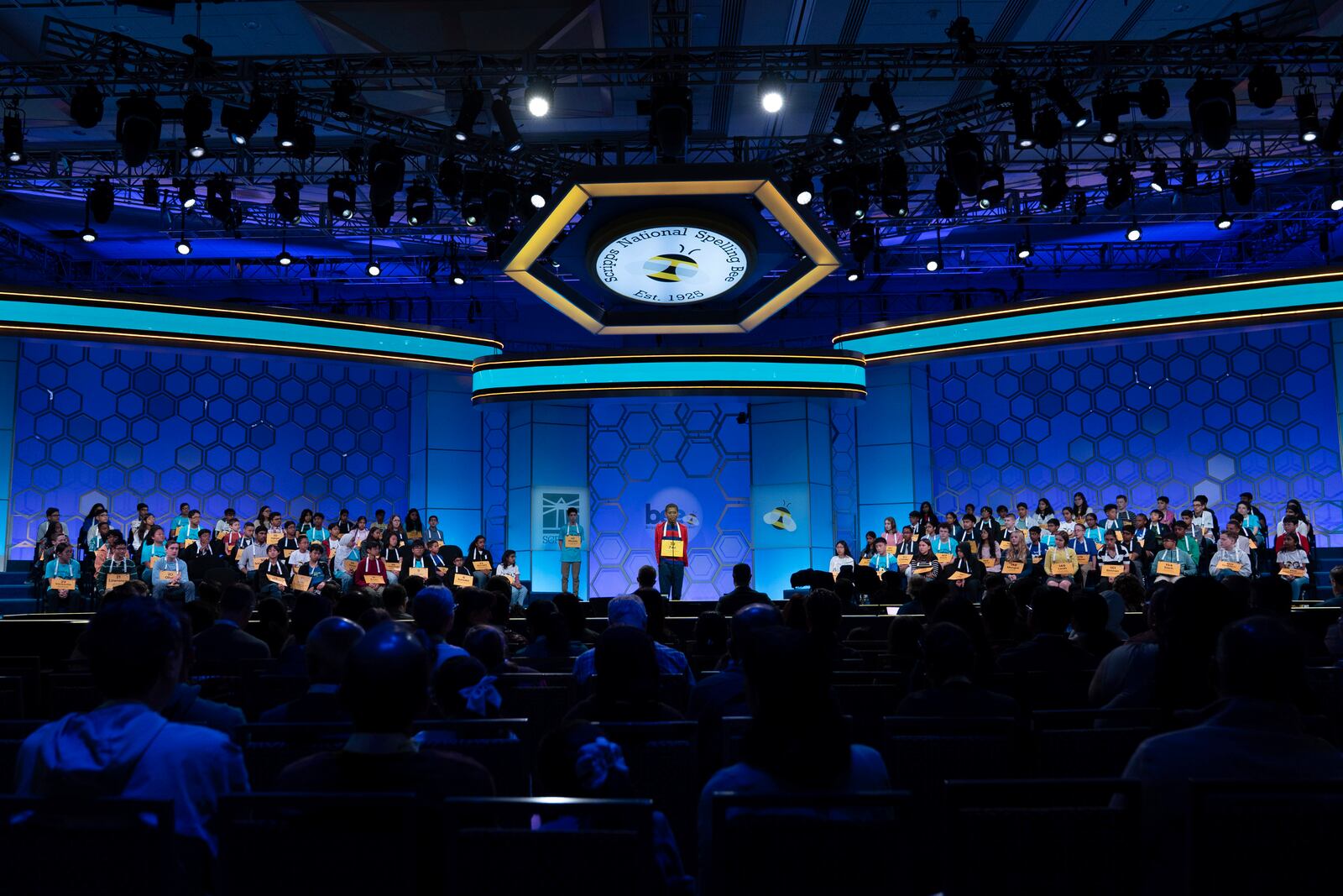 Zwe Sunyata Spacetime, 13, of Washington, spells his word as he competes during the quarterfinals of the Scripps National Spelling Bee at the Gaylord National Resort & Convention Center, Wednesday, May 28, 2025, in Oxon Hill, Md. (AP Photo/Jose Luis Magana)