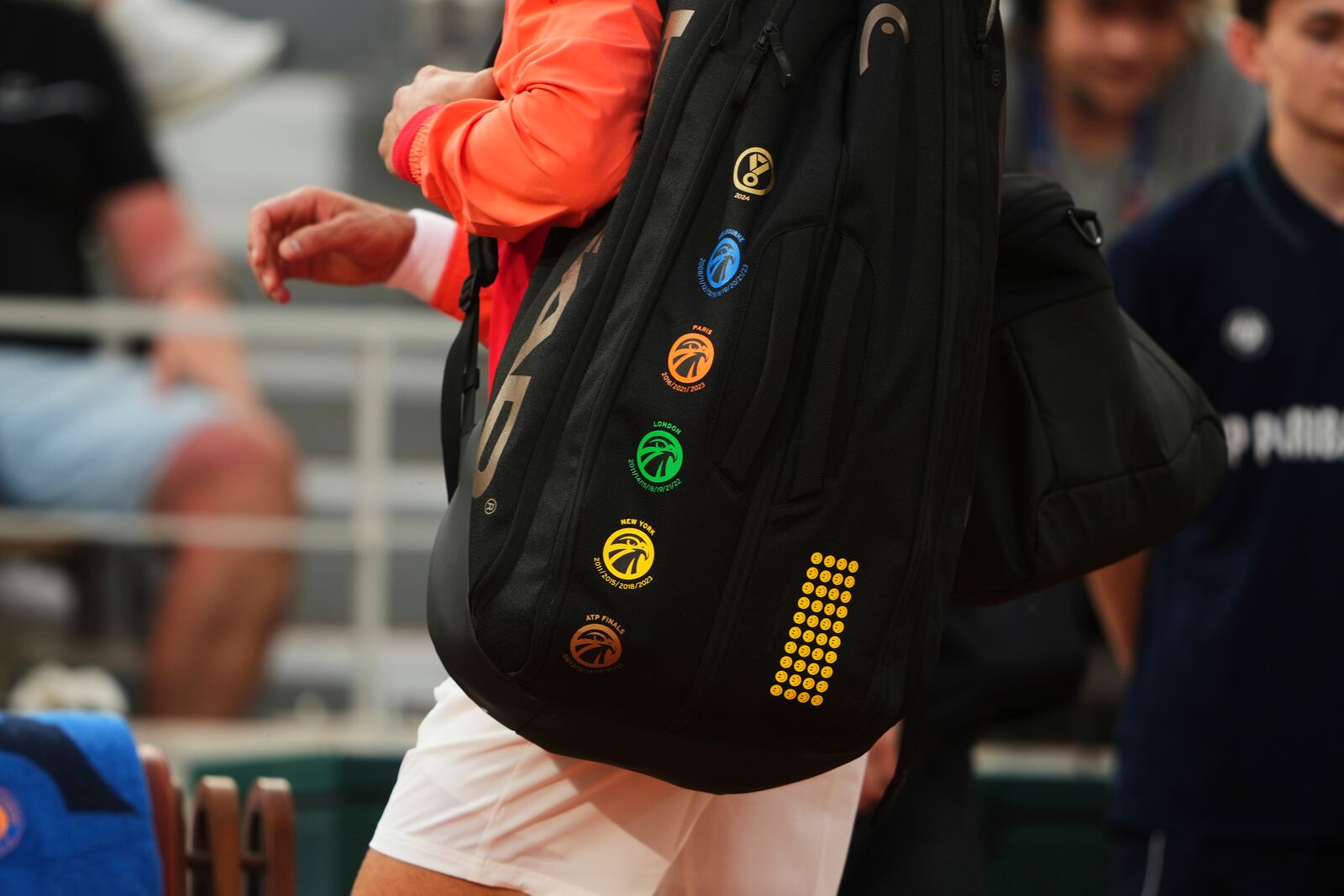 Serbia's Novak Djokovic enters the court to play Austria's Filip Misolic ahead of their third round match of the French Tennis Open, at the Roland-Garros stadium, in Paris, Saturday, May 31, 2025. (AP Photo/Lindsey Wasson)