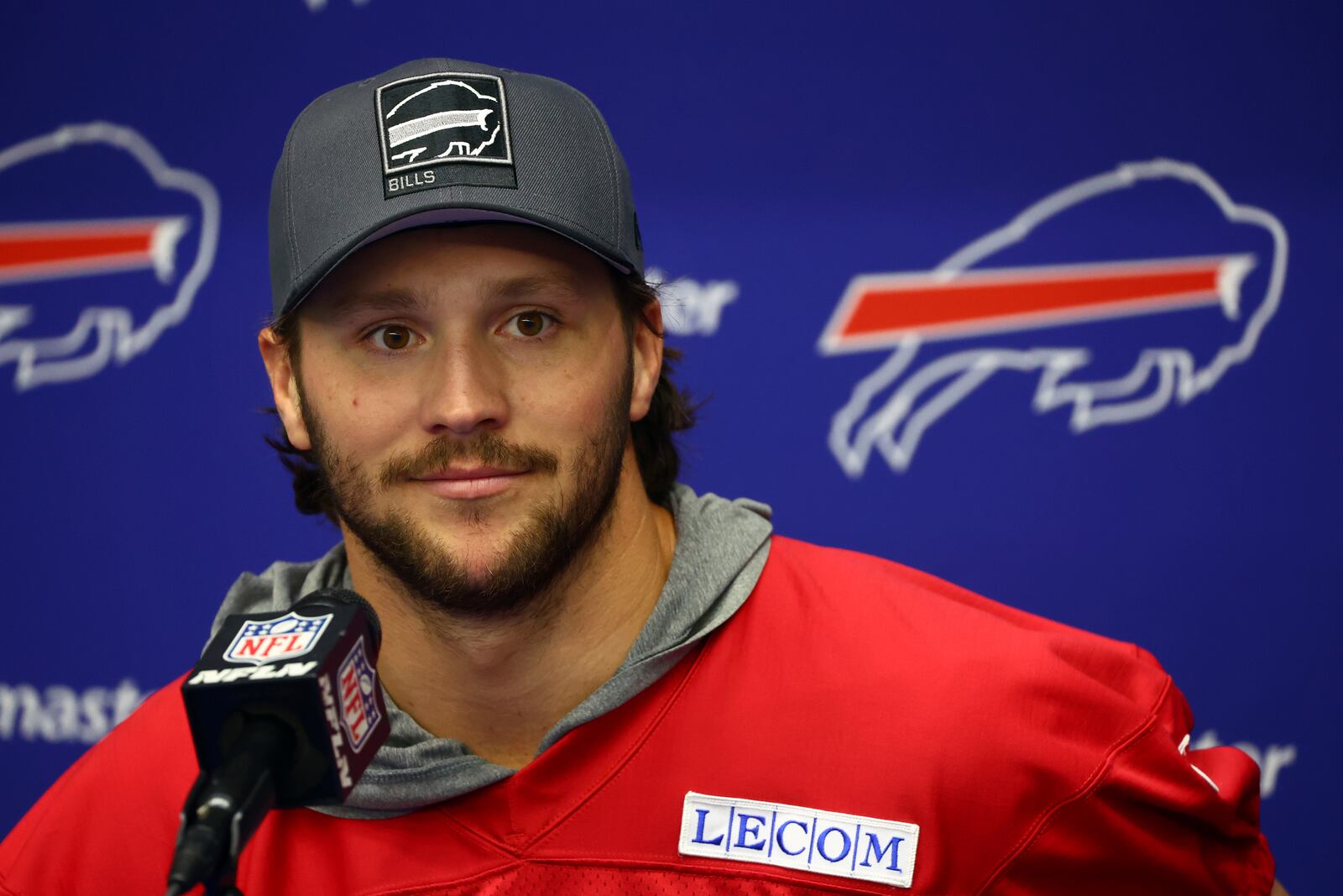 Buffalo Bills Josh Allen (17) addresses the media after practice at NFL football minicamp in Orchard Park, N.Y., Tuesday June 10, 2025. (AP Photo/Jeffrey T. Barnes)