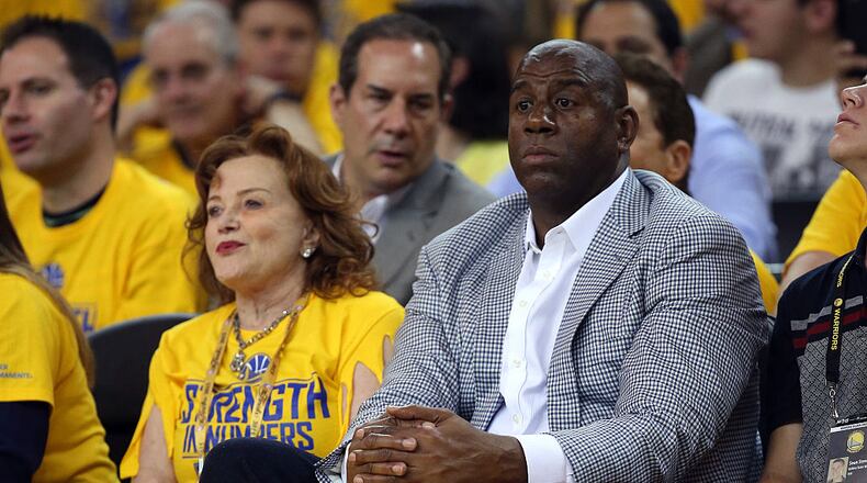 OAKLAND, CA - JUNE 04: Magic Johnson attends Game One of the 2015 NBA Finals between the Golden State Warriors and the Cleveland Cavaliers at ORACLE Arena on June 4, 2015 in Oakland, California. (Photo by Ezra Shaw/Getty Images)