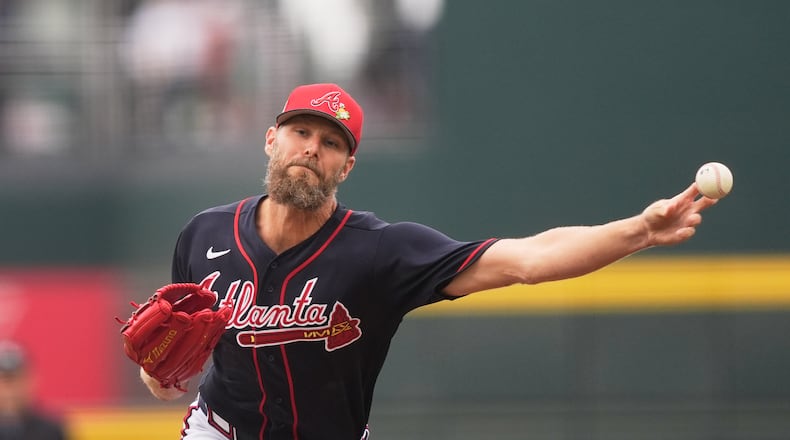 CORRECTS CITY TO NORTH PORT FLORIDA NOT BRADENTON - Atlanta Braves pitcher Chris Sale delivers in the first inning of a spring training baseball game against the Minnesota Twins in North Port, Fla., Sunday, Feb. 22, 2026. (AP Photo/Gerald Herbert)