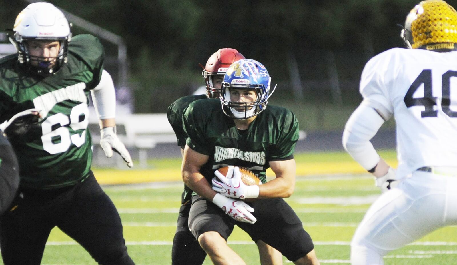 North running back Bailey Wallen (Brookville) makes a short gain. The North defeated the South 13-7 in the MVFCA All-Stars football game at Centerville on Friday, June 8, 2018. MARC PENDLETON / STAFF
