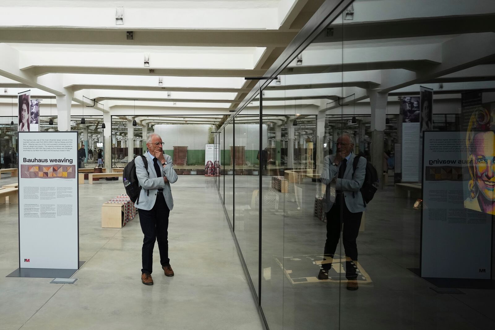 A visitor observes the Museum of Survivors, located in a factory where Oskar Schindler saved some 1200 Jews during the WWII, in Brnenec, Czech Republic, Saturday, May 10, 2025. (AP Photo/Petr David Josek)