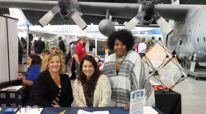 88th Force Support Squadron’s Workforce Element assists with a pre-COVID educational fair event held Oct. 24, 2019, at the National Museum of the U.S. Air Force. The team is now ramping up for the CY21 Mentoring Program at Wright-Patterson Air Force Base and is especially interested in mentors for it. Starting at left are Tammi Dyson and LeAnna Gorman, management analysts; and Sherita Smith, human resources specialist. Contributed photo