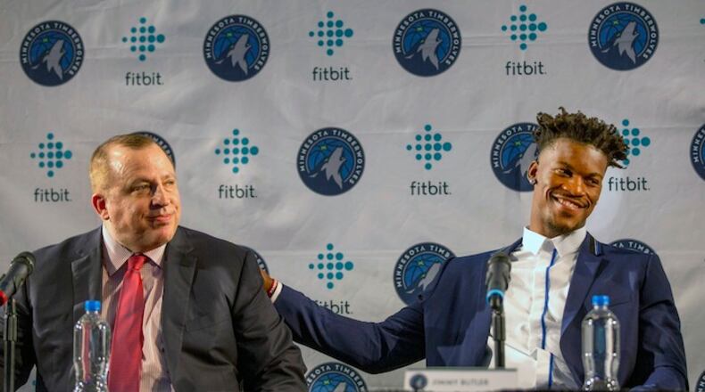 Minnesota Timberwolves new point guard Jimmy Butler, right, pats Timberwolves head coach Tom Thibodeau on the back during a press conference at Mall of America in Bloomington, Minn. on Thursday, June 29, 2017.(AP Photo/Andy Clayton-King)