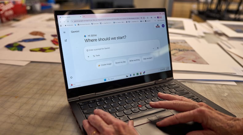 Art teacher Joyce Hatzidakis uses the AI tool Google Gemini in her high school classroom Thursday, Jan. 22, 2026, Riverside, Calif. (AP Photo/Damian Dovarganes)