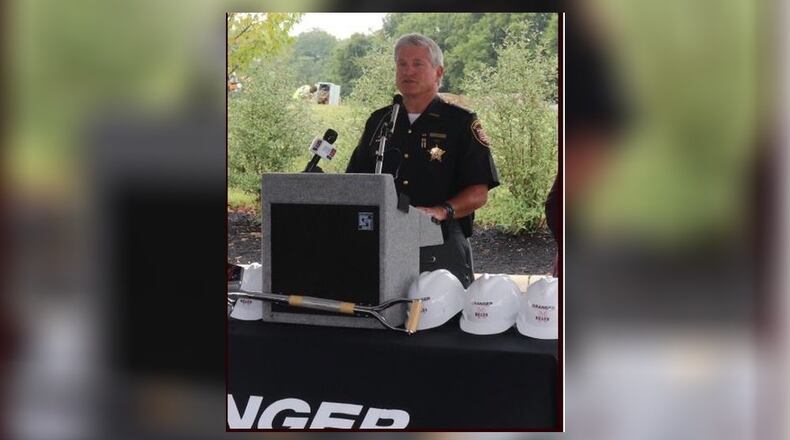 Warren County Sheriff Larry Sims at Tuesday’s groundbreaking for the $56 million jail and sheriff’s office project. A worker can be seen in the background. LAWRENCE BUDD/STAFF