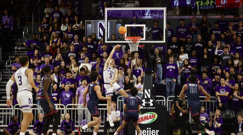 Northwestern's Ryan Langborg scores against Dayton in the first half on Friday, Nov. 10, 2023, at Welsh-Ryan Arena in Evanston, Ill. David Jablonski/Staff