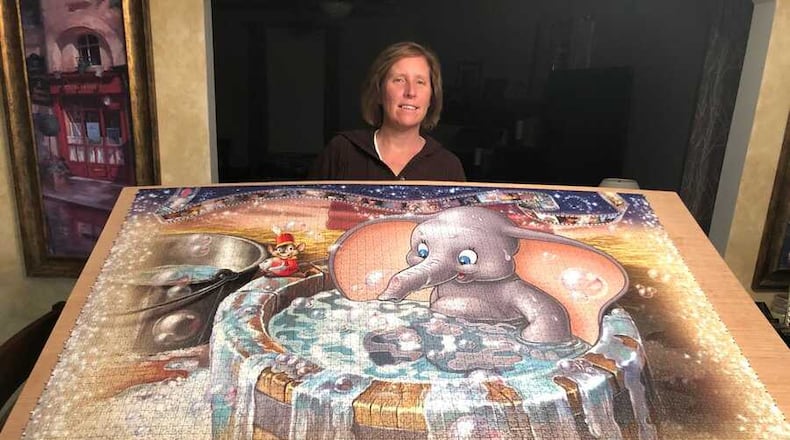 Heather Bridgman has been putting together a 40,000-piece Disney puzzle since 2020 and is almost finished. CONTRIBUTED