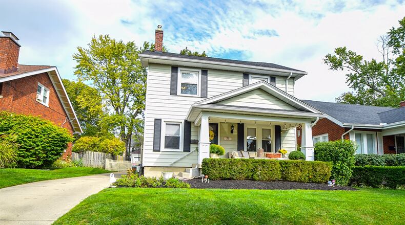 The vinyl-sided, 2-story has about 2,210 sq. ft. of living space with a full, unfinished basement. The property has a gated concrete driveway that leads to the 2-car, detached garage. The gate that accents the driveway is part of the fenced back yard. CONTRIBUTED PHOTO