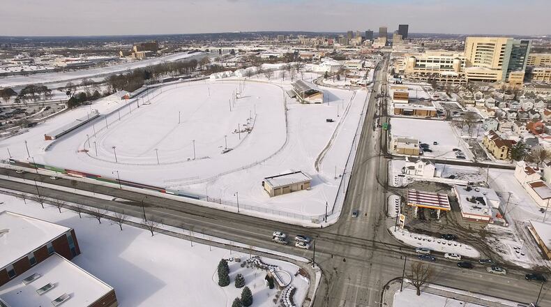 The old Montgomery County Fairgrounds on the left, from the South Main Street and Stewart St. intersection. The University of Dayton and Premier Health have received more than 1,300 ideas about what to do with the former Montgomery County Fairgrounds site. Some common themes emerged from the input garnered from a public workshop, stakeholder meeting and an online web tool about the future of the 38-acre site, according to information released by planning NEXT, which UD and Premier hired to help develop a vision for the site. TY GREENLEES / STAFF