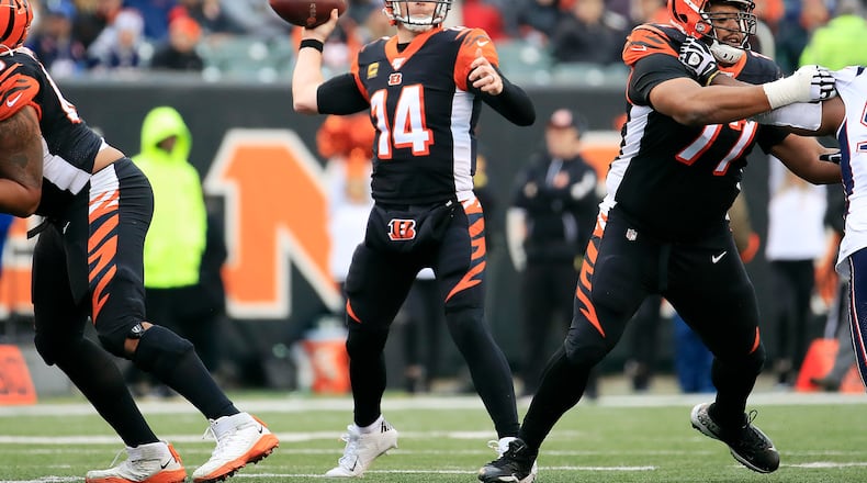 CINCINNATI, OHIO - DECEMBER 15: Andy Dalton #14 of the Cincinnati Bengals throws a pass during the second half against the New England Patriots in the game at Paul Brown Stadium on December 15, 2019 in Cincinnati, Ohio. (Photo by Andy Lyons/Getty Images)