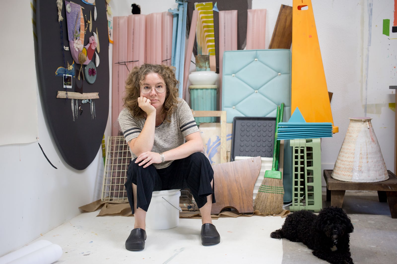 Artist Ashley Jude Jonas with her work. She teaches in the Department of Art and Design at the University of Dayton and runs Blue House gallery with her partner, Nicholaus Arnold.