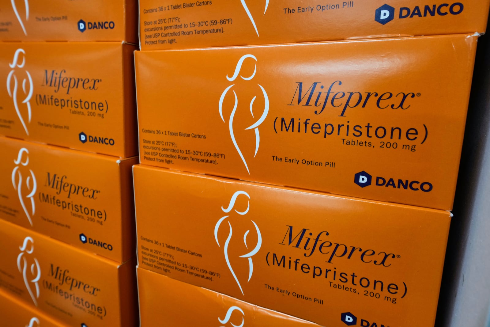 Boxes of Mifeprex, which will be sent out to clients, are stacked at the Massachusetts Medication Abortion Access Project, May 13, 2025, in Somerville, Mass. (AP Photo/Charles Krupa)