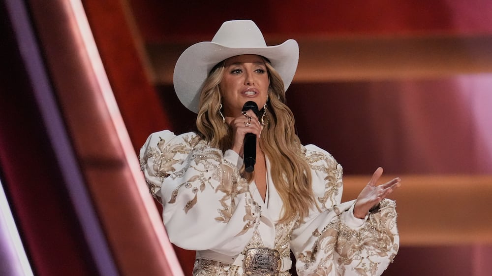 Host Lainey Wilson speaks during the 59th Annual Country Music Association Awards on Wednesday, Nov. 19, 2025, at Bridgestone Arena in Nashville, Tenn. (AP Photo/George Walker IV)