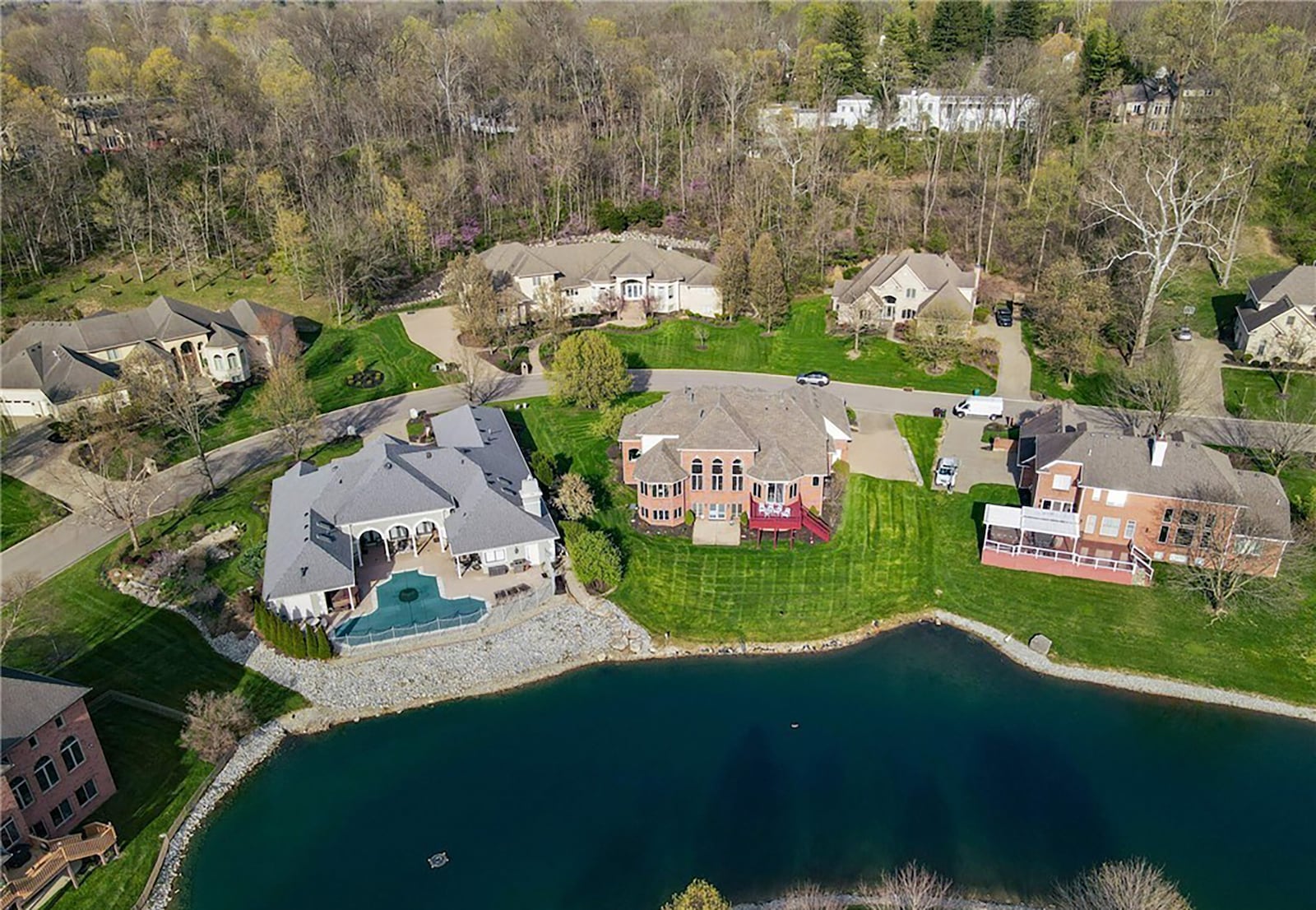 The home is on the shore of a neighborhood lake in Sterling Cove. CONTRIBUTED