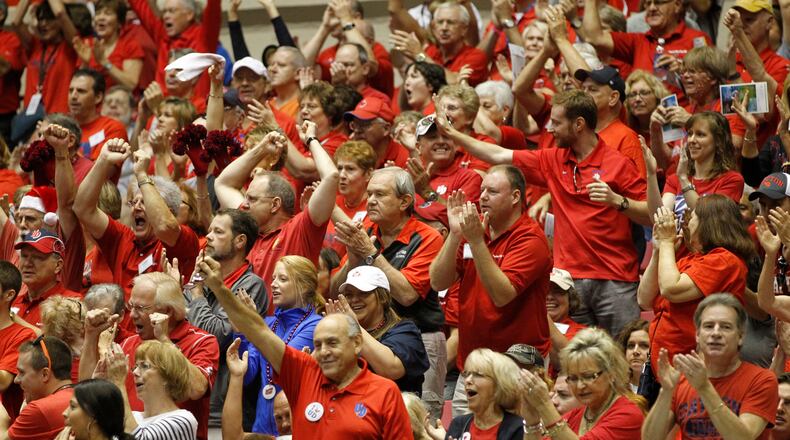 Dayton fans cheer during a game against Texas A&M in the first round of the Puerto Rico Tip-Off on Thursday, Nov. 20, 2014, at Coliseo Roberto Clemente in San Juan, P.R. David Jablonski/Staff