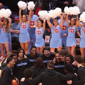 Dayton huddles before a game against Loyola Chicago on Friday, Jan. 16, 2026, at UD Arena. David Jablonski/Staff