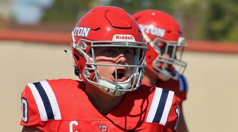 Dayton's Jack Cook reacts after running for a touchdown against Presbyterian on Saturday, Sept. 25, 2021, at Welcome Stadium. David Jablonski/Staff