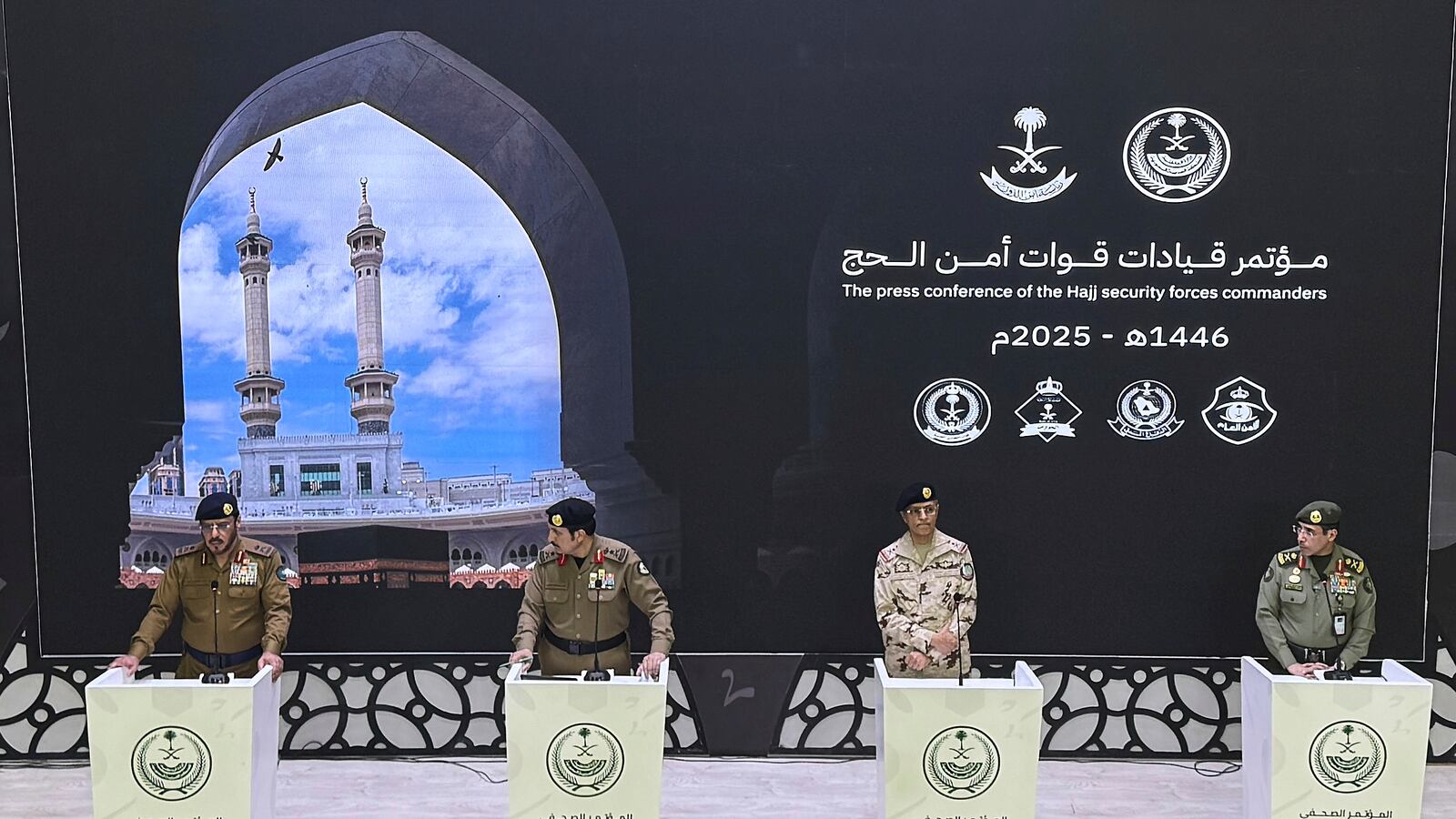 From left to right; Director General of Civil Defense Major General Dr. Hamoud bin Suleiman Al-Faraj, Director of Public Security and Chairman of the Hajj Security Committee Lieutenant General Mohammed Al-Bassami, Commander of the Special Emergency Forces at the Presidency of State Security Lieutenant General Mohammed Al-Omari and Acting Director General of Passports Major General Dr. Saleh Al-Murabba speak during the Hajj security press conference at the 911 headquarters in Mecca, Saudi Arabia, Sunday, June 1, 2025. (AP Photo/Baraa Anwer)